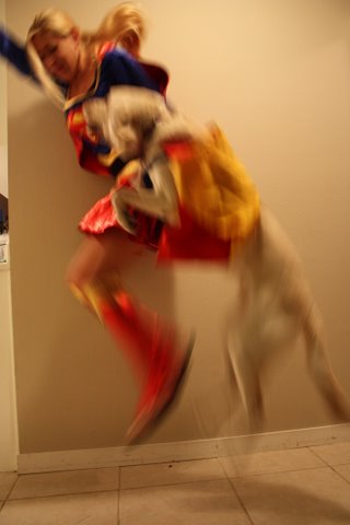 Supergirl and dog take off